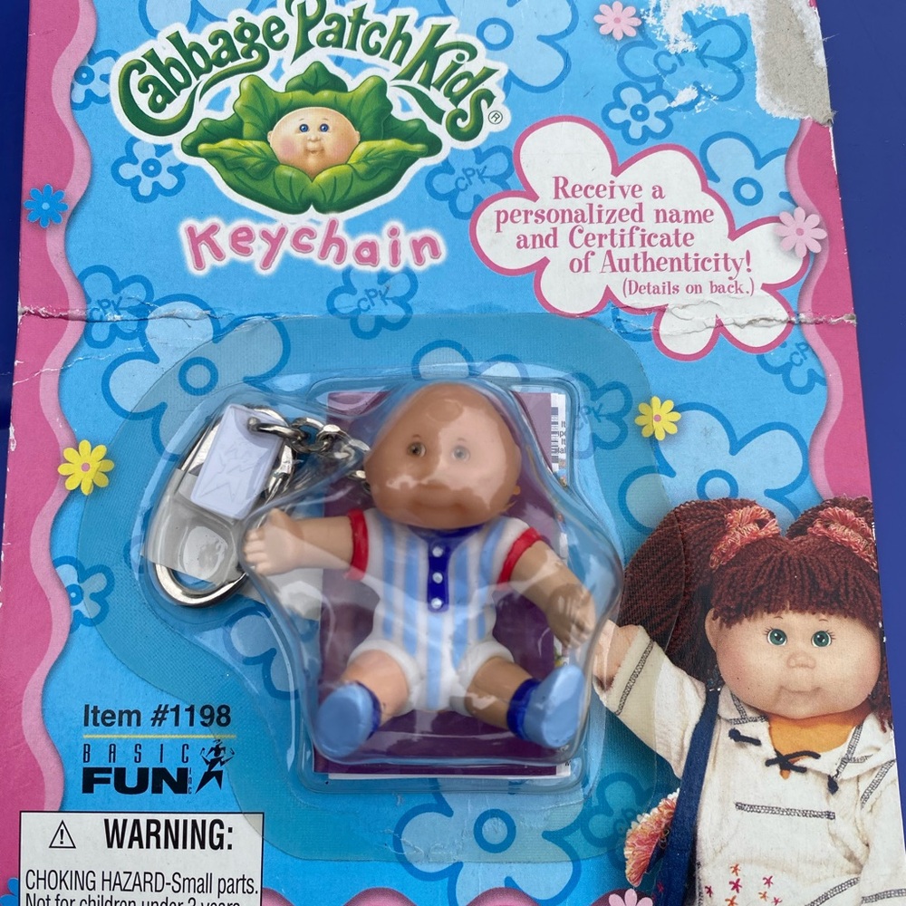 Cabbage Patch Kids Keychain with Colorful Outfits
